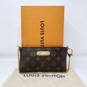 SOLD!  Louis Vuitton Monogram Pochette Milla. Code: VI5008. Made in France! 